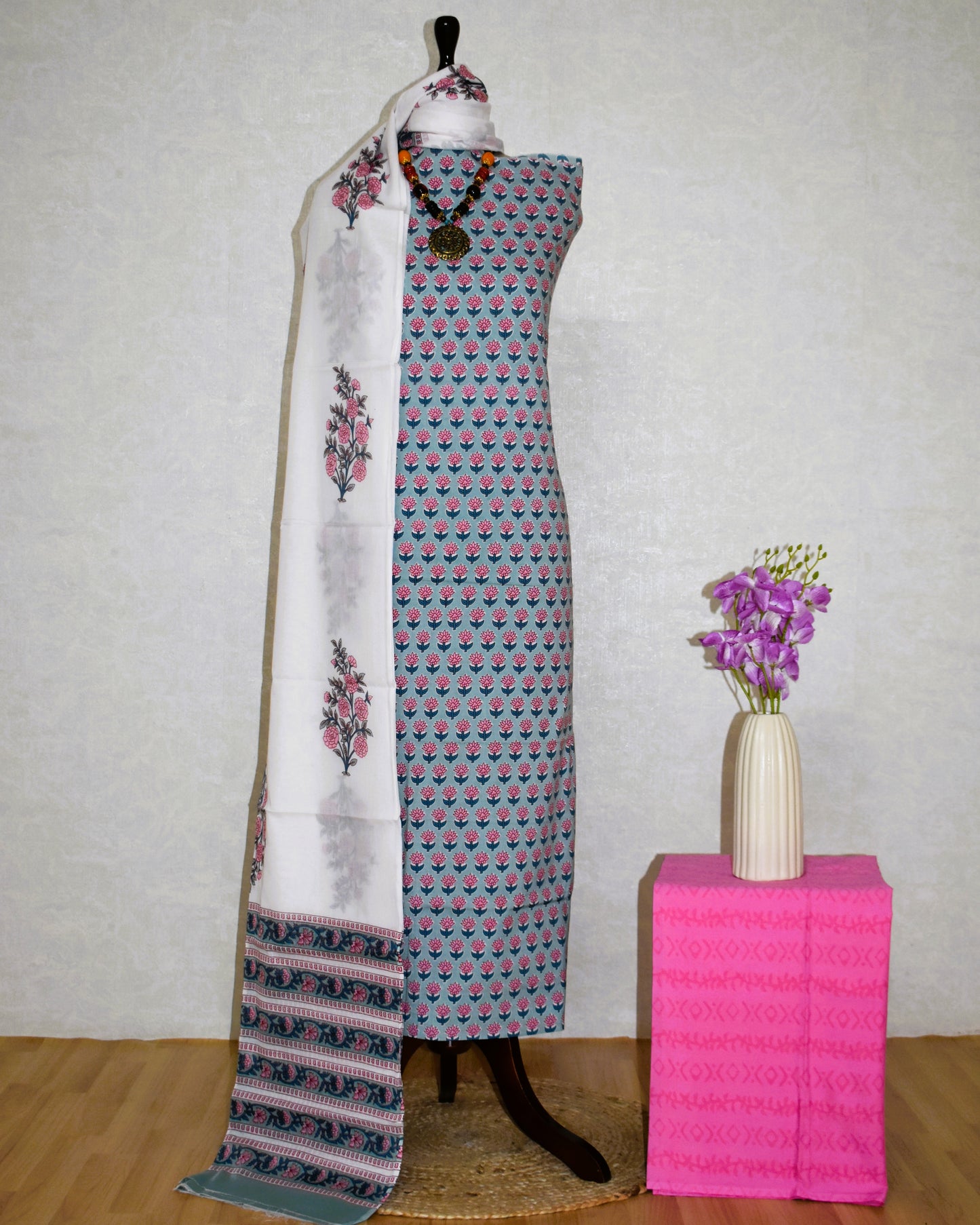 All-over Pink Floral Buti in Sky Blue Hand Block Printed Cotton Suit with Malmal Dupatta