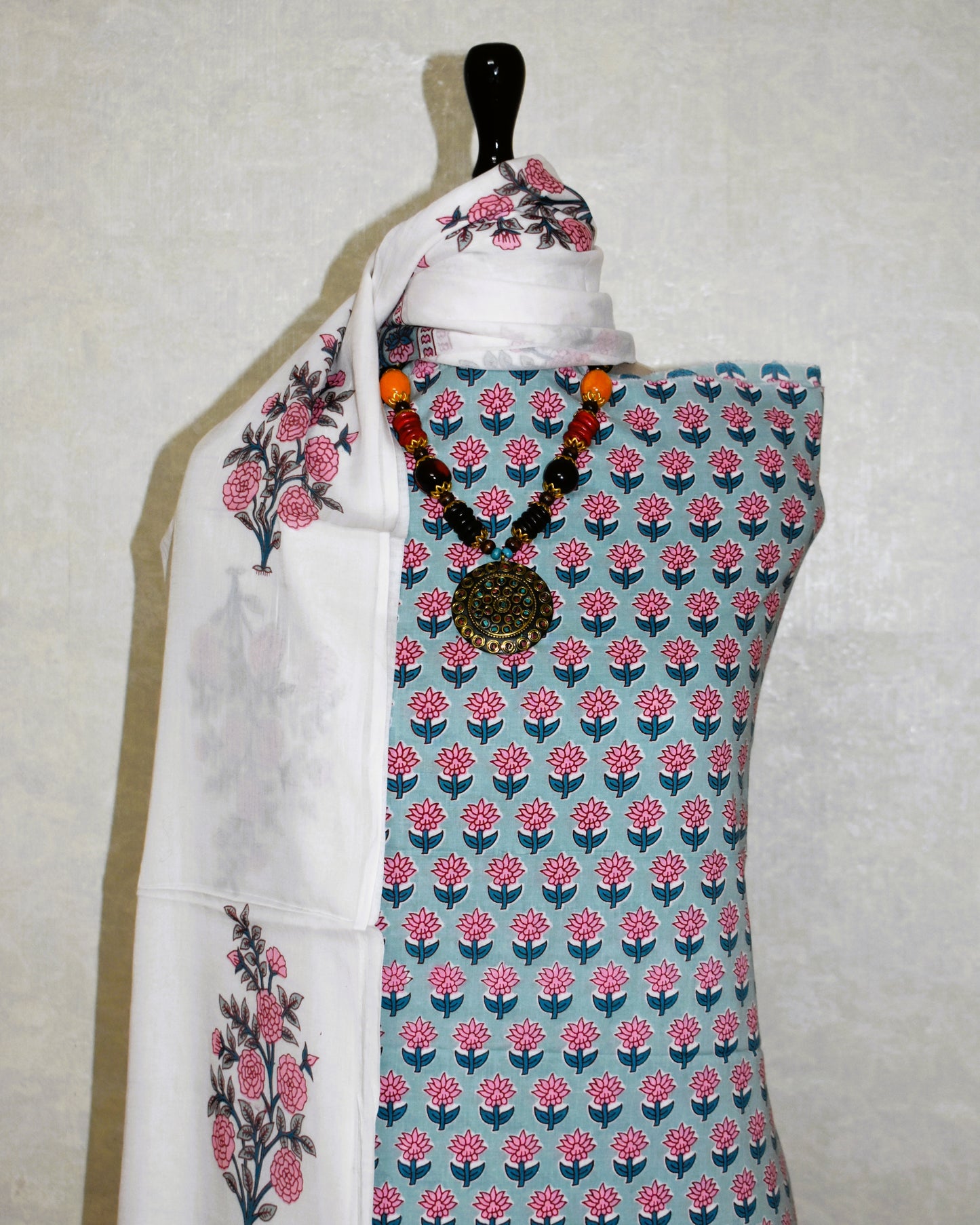 All-over Pink Floral Buti in Sky Blue Hand Block Printed Cotton Suit with Malmal Dupatta