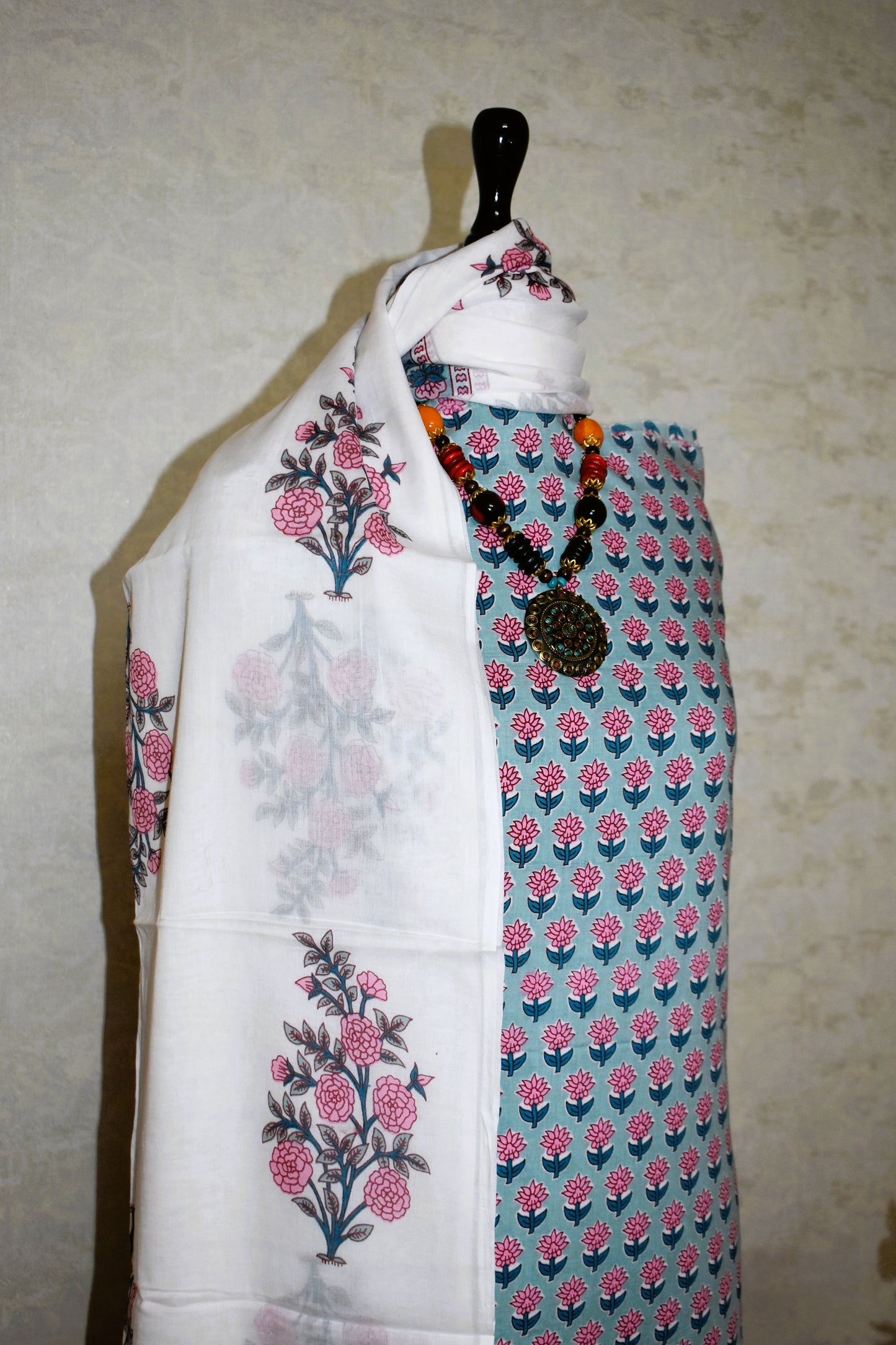 All-over Pink Floral Buti in Sky Blue Hand Block Printed Cotton Suit with Malmal Dupatta